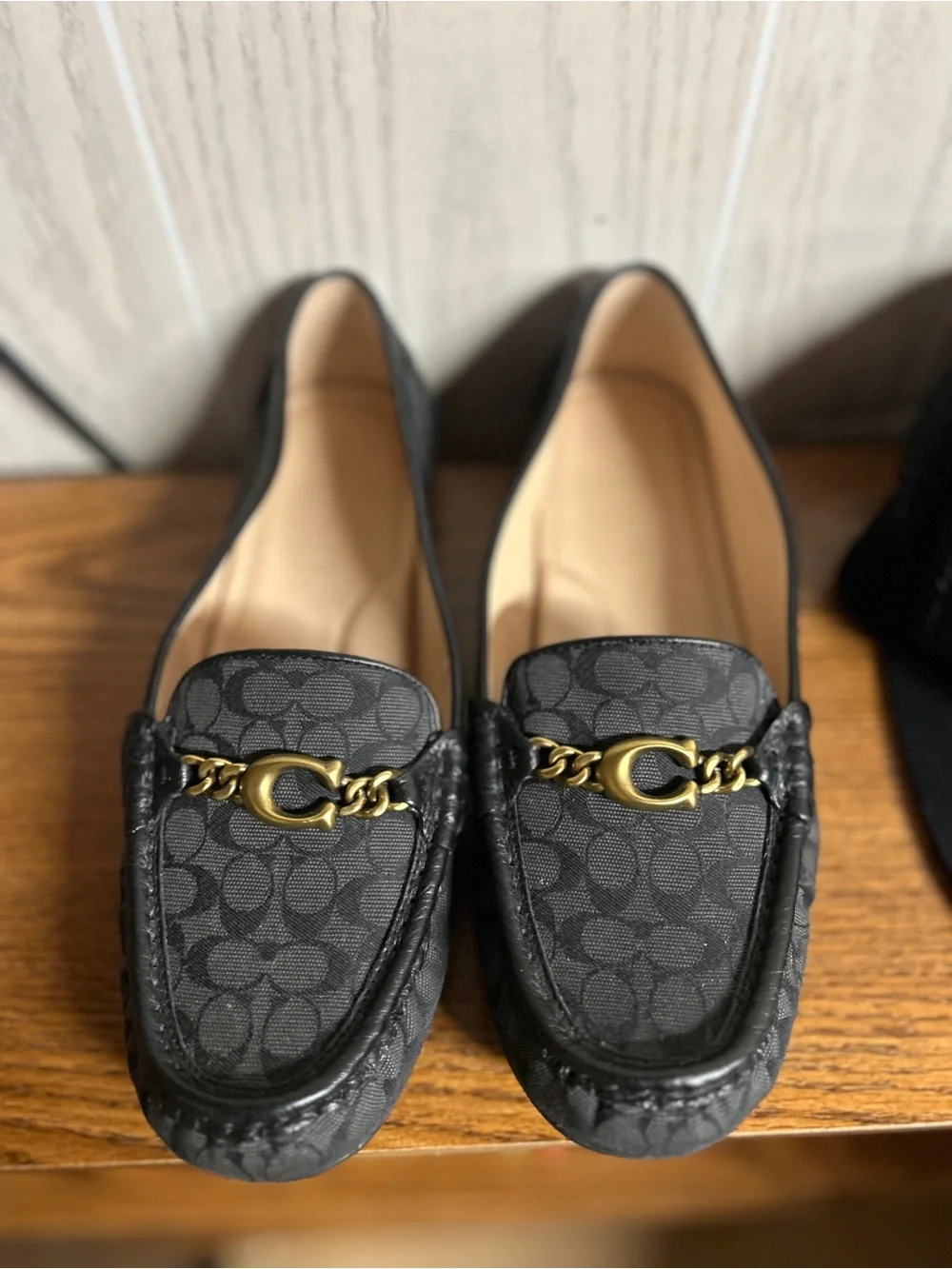 Coach detail loafers